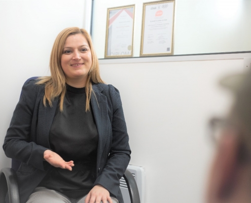 a business coach is talking to her client